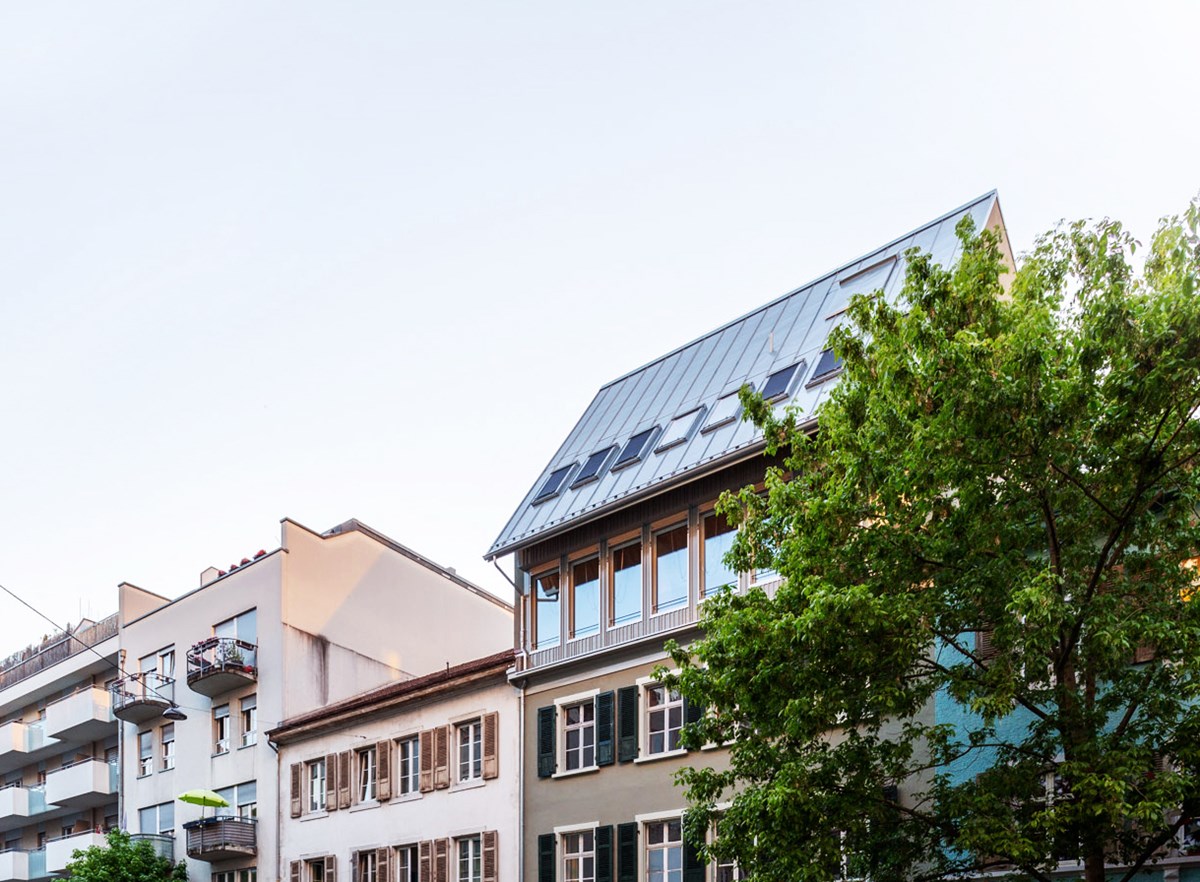 Roof Extension in Wasserstrasse, Basel, by Atelier Atlas Architektur: Join this session at the Build for Life Conference 2021 to learn how a 19th century building became more flexible.Photo: Armin Schaerer. 